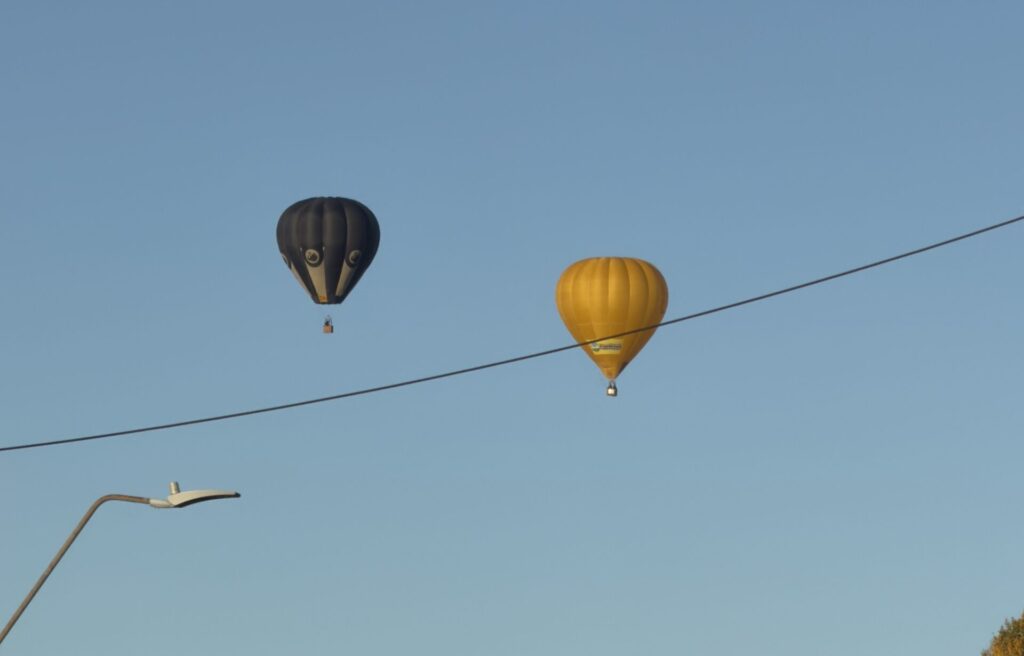 two baloons in Carterton above the main road